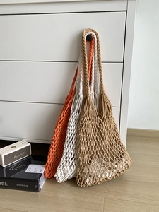 Handwoven large capacity cotton rope mesh bags in orange, white and khaki for beach vacations