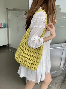 Handmade bright yellow woven hollow cotton rope tote bag for summer beach travel