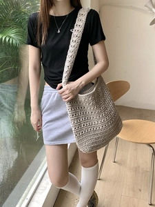Bohemian beige hand-woven cotton tote bag with crochet hollow patterns and wide shoulder strap