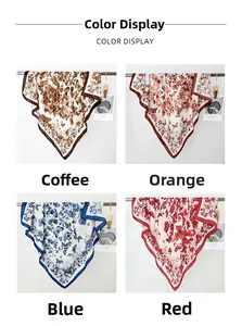 Detailed close-up of four butterfly print scarves showing edges and vibrant fabric texture