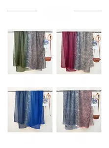 Detailed color display of four paisley scarves in green, red, blue, and grey options