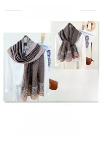 Detail of coffee brown retro paisley and interlocking pattern scarf with silky texture