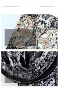 Detail view of ethnic paisley pattern scarf with fine stitching and soft fabric texture