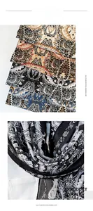 Detailed view of the exotic paisley pattern on soft imitation cashmere scarf texture