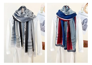 Detail of luxury printed scarves in grey-black and red-blue patterns on white shirt