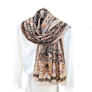 Ethnic style paisley printed scarf for women with vintage floral pattern in beige and rust
