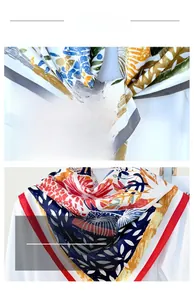 Detail of premium silk scarf showing vibrant prints and fine hand-rolled edge stitching