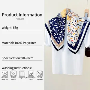 Abstract leaf print 90cm square silk-like polyester scarf in navy, yellow and brick red