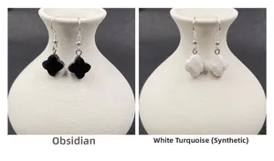 Close-up of four-leaf clover earrings in black obsidian and white turquoise options