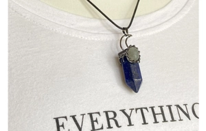 Lapis lazuli hexagonal prism pendant necklace featuring antique silver crescent moon detail