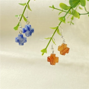 Cross-shaped natural stone earrings in blue and orange colors on elegant metal hooks