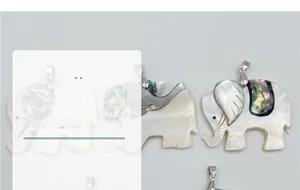 Detail of elephant pendant featuring white mother of pearl and abalone shell inlay