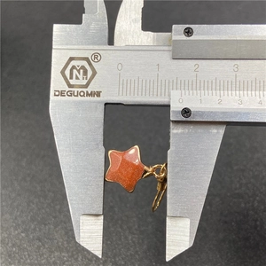 Measurement of 15mm star-shaped gold-plated earring with sparkling brown sandstone stone