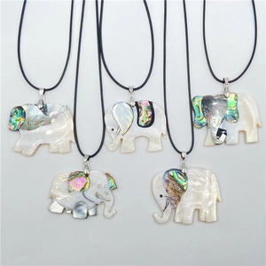 Handcrafted elephant pendant necklace set with natural abalone and white mother of pearl