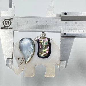 Elephant pendant with white shell and abalone inlay, measuring 4.8cm on a caliper