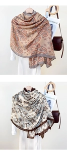 Detail of vintage paisley print cotton linen shawl with soft texture and contrast edges