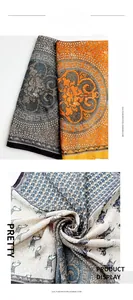 Detail of vintage square scarf featuring horse prints and retro floral patterns