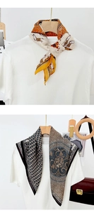 Detail view of silk scarves with vintage horse prints and geometric patterns on hangers