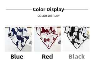 Detailed view of camellia print silk scarves in navy blue, burgundy, and black colors