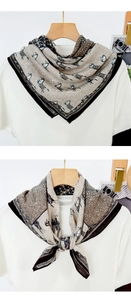 Detailed view of vintage horse print silk scarf with classic plaid and geometric patterns