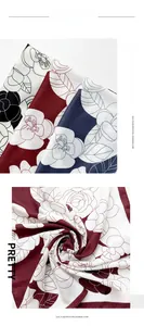 Detail of camellia floral print on soft imitation cashmere scarves in three colors