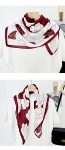 Close-up of lightweight square scarf with burgundy camellia print and contrast piping