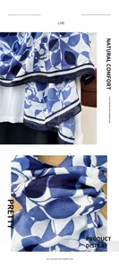 Detail of blue and white floral pattern on a soft imitation cashmere long scarf shawl