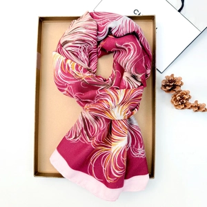 Elegant burgundy cotton linen scarf with feather print in a premium gift box