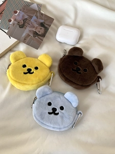 Three plush bear coin purses in yellow, brown and blue with metal carabiners