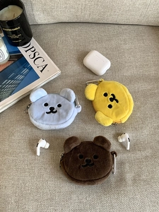 Three plush bear coin purses in blue, yellow and brown colors with metal zipper hooks
