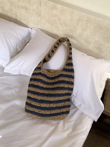Stylish striped straw woven tote bag for summer beach holidays in navy and khaki