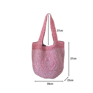 Detail view showing dimensions of pink and purple crochet tote bag with smiley face embroidery