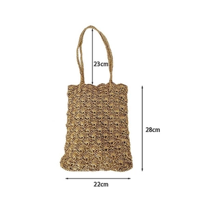 Detailed dimensions of the hand-woven shoulder bag with intricate crochet pattern