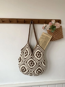 Handmade crochet tote bag with brown and white bohemian granny square pattern