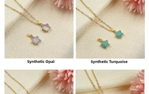 Detailed view of gold pentagram pendants with synthetic opal and turquoise stones