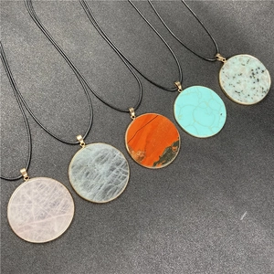 Five round natural stone pendant necklaces with gold plating and black cord chains