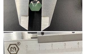 Detailed measurement of a 10mm hexagonal green stone pendant with silver metal edging