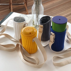 Detailed view of quilted fabric water bottle carriers with adjustable shoulder straps