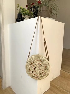 Handmade round straw shoulder bag with colorful beads for beach vacation style