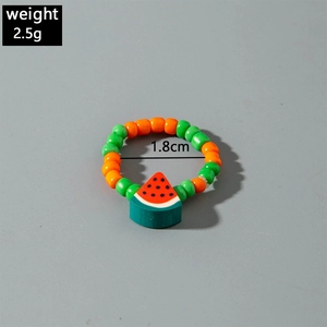 Detail of beaded fruit ring with watermelon charm showing 1.8cm diameter and 2.5g weight