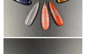 Macro detail of various colorful water-drop gemstones for DIY jewelry crafts
