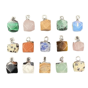Collection of 15 natural faceted crystal stone pendants with metal loops on white background