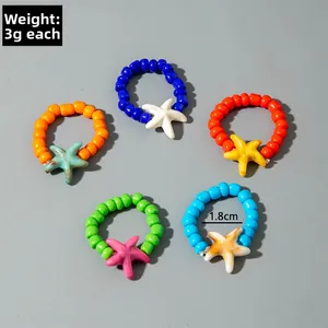 Detailed view of colorful starfish beaded rings with weight and size specifications