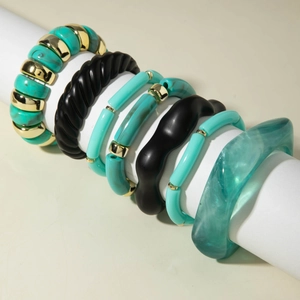 7-piece bohemian bracelet set with acrylic beads, resin bangles, and turquoise accents