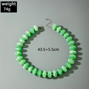 Detail of colorful acrylic beaded necklace showing weight 74g and size dimensions