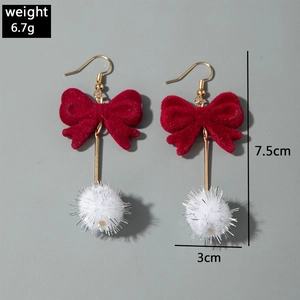 Red velvet bow earrings with white fuzzy pompom and gold stem for Valentine's Day
