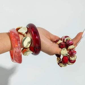 Stacked vintage red resin marble bangles with gold curved tube beaded bracelets for women