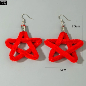 Detail view of red velvet star earrings with size and weight measurement data