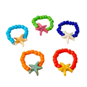 Five-piece set of colorful beaded rings with resin starfish charms in summer ocean style