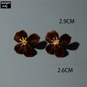 Detailed size view of red velvet flower earrings with pearl and gold centers